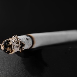 a close up of a cigarette on a table