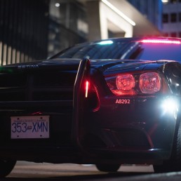 a police car parked on the side of the road